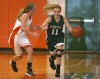 Wheeler's Shannon Eden chases Whiting's Brianna Blackwell