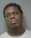 4 charged in Lansing burglary