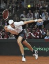 Harrison, Isner complete US rout of Switzerland