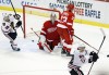 Blackhawks top Red Wings in SO, extend streak 
