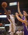 Seton's Kamal Shasi drives to the basket against Harrisburg's defense during Saturday night's Class 2A championship.