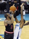 Carlos Boozer, Trevor Ariza