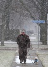 Snow begins falling on region; flights canceled