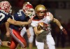 Lewis Cass' Sheldon Slusser, 10, gets one hand on Andrean running back Donovan Chandler