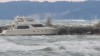 Crews working to save yacht from huge waves