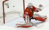 Bruins beat Hawks in OT, tie series