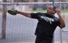 Illiana Christian's Tyler Watts competes in the discus at Saturday's T.F. South Invitational..