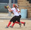 Portage's Kiley Jones catches a pup up bunt while teammate Alexis Johnson backs her up Saturday afternoon in semifinal play against Northridge at the Class 4A Harrison Semistate.