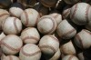 A basket of baseballs sits on the field at U.S. Steel Yard 