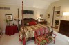 Warmth and worldly flair define a vast riverside estate