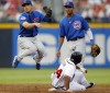 Braves hit 4 homers to beat Cubs