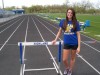Highland's Kat Smailis learned how to hurdle from an old friend