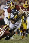 RG3 hurt, Seattle tops Redskins 24-14 in playoffs