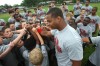 Pierre Thomas huddles with students