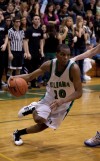 Illiana Christian's Brandon Martin dribbles down