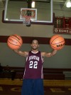 Justin King, palming basketballs