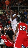 Lake Central's Tye Wilburn shoots against Morton's Travon Atkins on Friday.