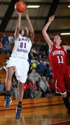 E.C. Central's Natisha Jones shoots past Munster's Jennifer Allen