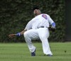 Byrd blasts Wrigley turf after Reds beat Cubs 8-7