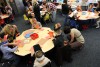 Kids talk turkey during pre-Thanksgiving Day activities in Hobart, Cedar Lake
