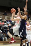 Crown Point's Josh Berqist goes up to shoot and draws a foul from Michigan City's Ryan Taylor on Thursday night.