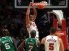 Bulls rally late without Rose to bump off Boston