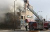 Firefighters battle vacant building blaze