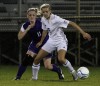 Lake Central's Alana Eatinge steals the ball from Merrillville's Alexis Alexander