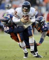 Von Miller, Elvis Dumervil, Caleb Hanie