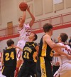 Hebron's Kyle Joyce shoots over Kouts' Cole Van Dyke