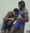 Thonwood's Micheal Willis wrestles Cedric Remey at 140 pounds 