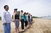 Hands Across Sand link activists