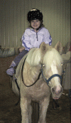 Therapeutic horseback riding assists children with special needs