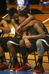 21st Century's Davis Jarnigan comforts teammate Dantrell Hurt