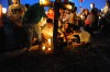 Family of dead woman honor her at vigil