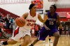 Portage forward Alexis Johnson, left, drives against Merrillville