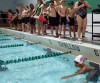 Swimmers prepare to enter the pool at the Valparaiso Junior Triathlon on Saturday.