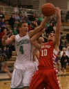 Valparaiso's Tyler Doane and Crown Point's Alex Nickla battle for a rebound