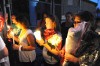 Family of dead woman honor her at vigil