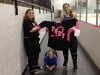 Girls hockey team scores to raise money for breast cancer awareness