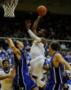 Bishop Noll's Adonis Filer shoots over the Tipton defense