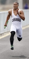 Mount Carmel's Darrion Hoard runs in the 400-meter relay at Saturday's Stagg Invitational.