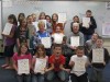 4th-graders dedicate poetry to retiring teacher and principal