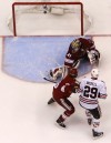 Hawks even go OT in their travels home Sunday