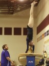 Merrillville's Kristina Goodman competes on vault at the Chesterton Sectional on Saturday. Goodman qualified for regional on floor.