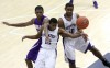 Hobart's David Thomas tries for the rebound as Merrillville's Kir'Varis Myricks, 12, and Breon Hill defend in the second half Thursday.