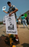 Groups protest in front of Bayh's offices about public option for medical care