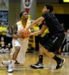 Valparaiso's Erik Buggs, left, and Green Bay's Carrington Love fight for possession