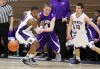Merrillville's Jalen Wilbert, left and Hobart's Patrick Wynn eye a loose ball during the first half Thursday.