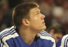 Boston Celtics' rookie forward Luke Harangody watches the clock